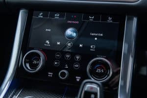 Range Rover Sport SVR -Estoril Blue control panel close up Hire Range Rover Sport control panel close up